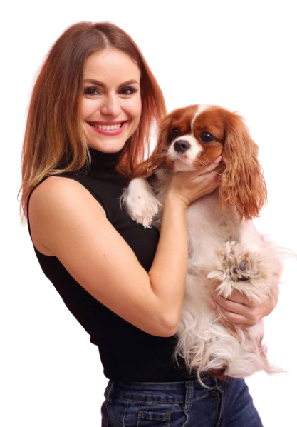 Happy woman hugging her Corgi